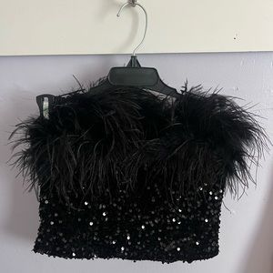 Line and dot sparkle and feather top.